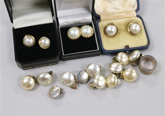 Two pairs of 9ct gold and mabe pearl earclips, assorted pairs of simulated pearl earclips and a silver and paste ring.